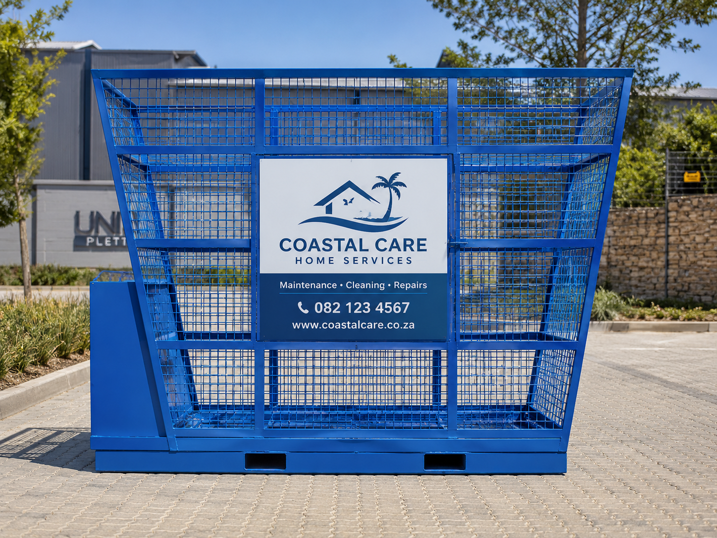 Blue recycling cage carrying a large square advertising panel in a business-park setting.